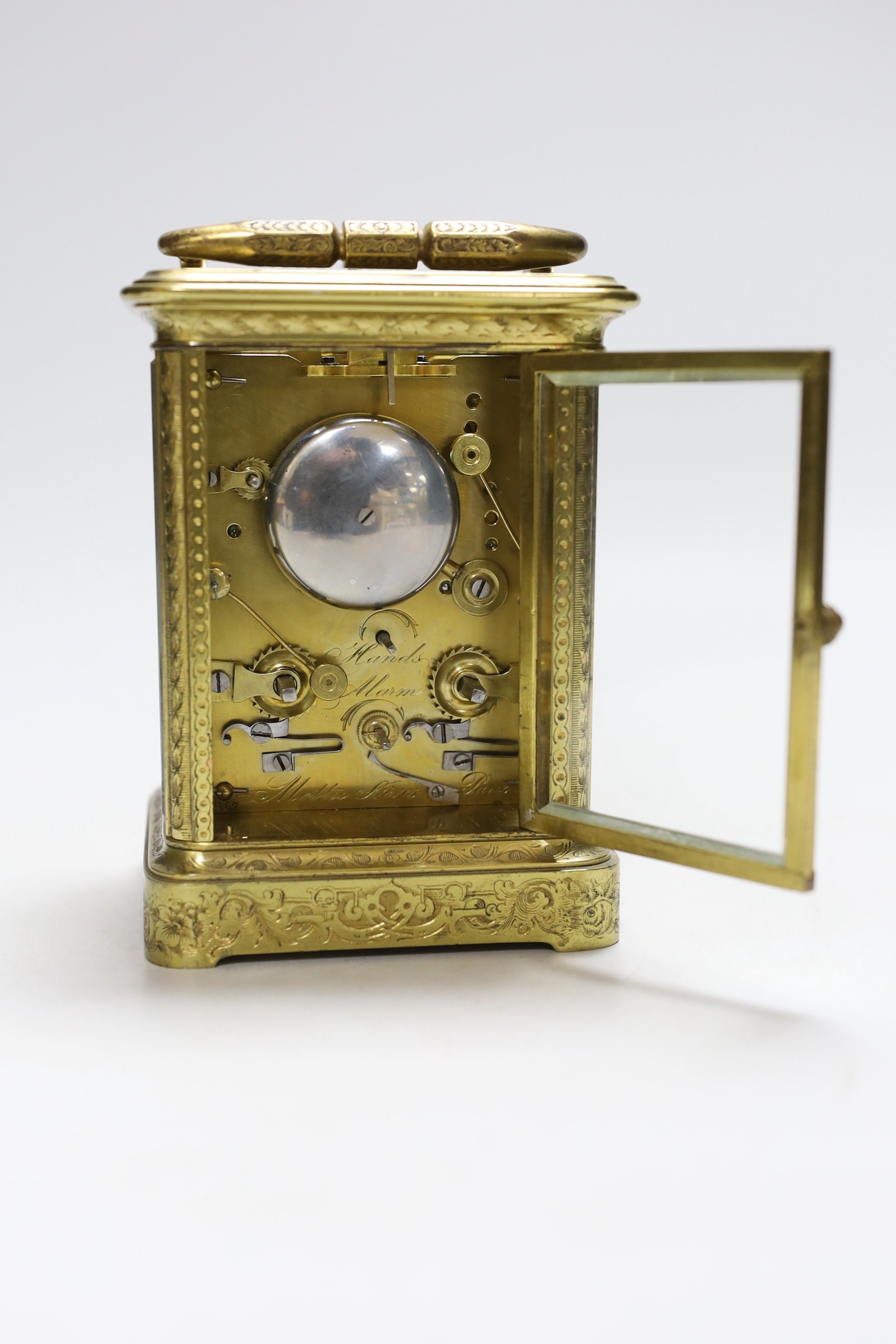 A late 19th century French engraved brass repeating carriage clock with alarm, signed Mottu Freres, Paris, 13cm high